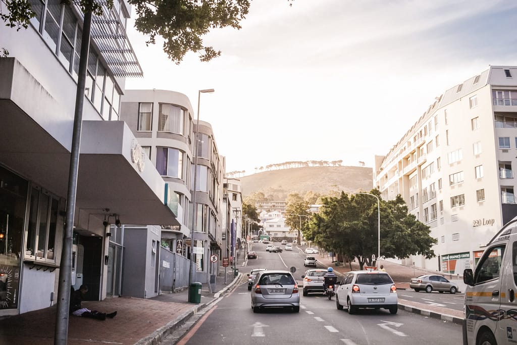 People driving moving out of the Cape Town city